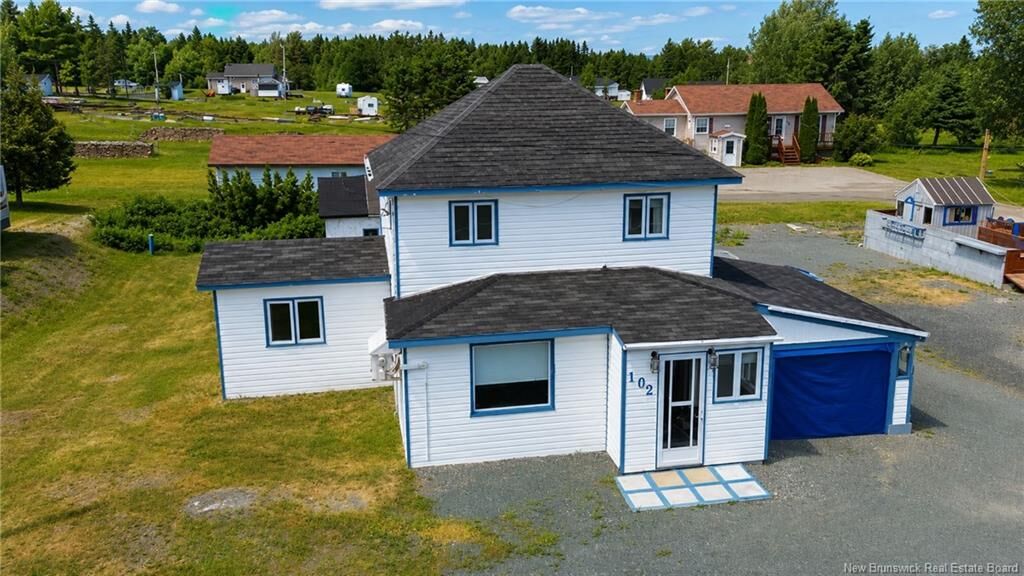 Property Photo:  102 Rue De La Gare  NB E8J 2Z1 