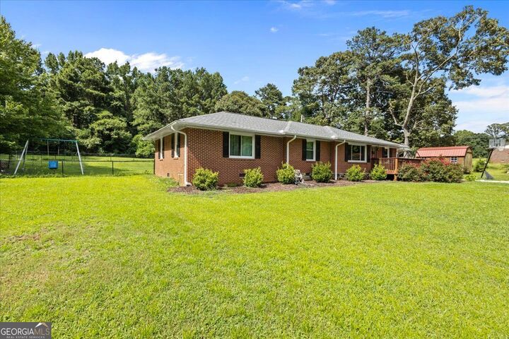 Property Photo: 8380 Ephesus Church Road GA 30180