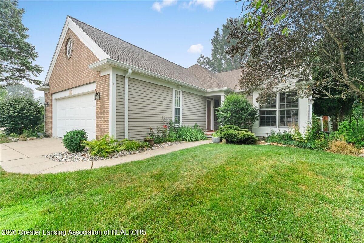 Property Photo:  1915 Creek Landing  MI 48840 