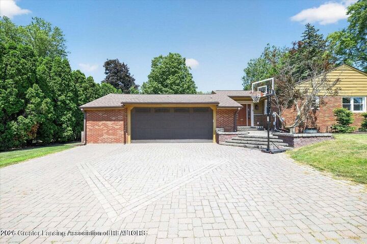 Property Photo:  876 Riverside Drive  MI 48875 