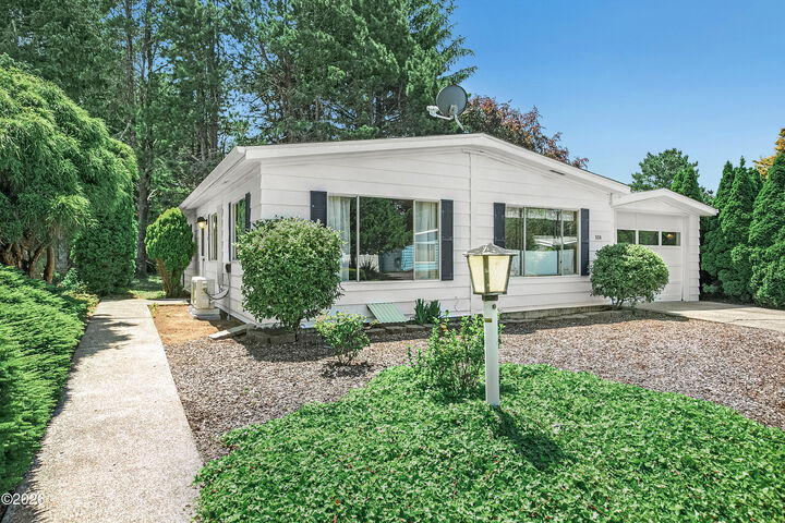 Property Photo:  324 NE 35th Street  OR 97365 
