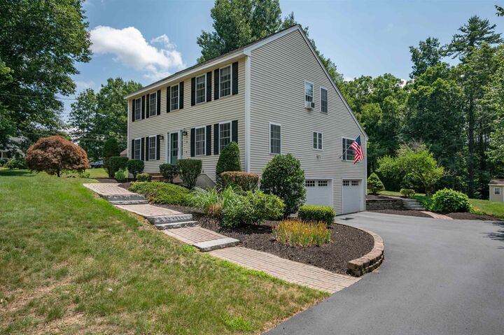 Property Photo:  14 Village Drive  NH 03811 