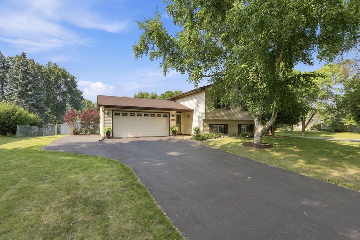 Property Photo:  11852 99th Avenue N  MN 55369 