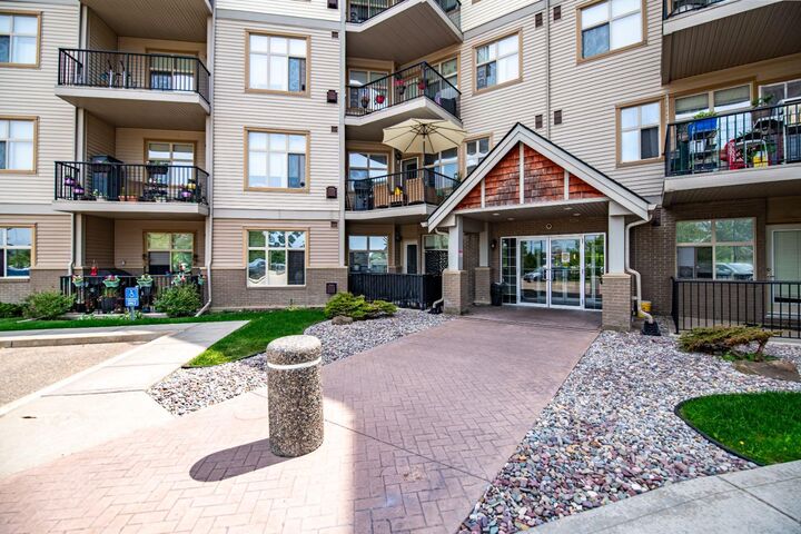 Property Photo: 100 Lakeway Boulevard 324 AB T4S 0A4