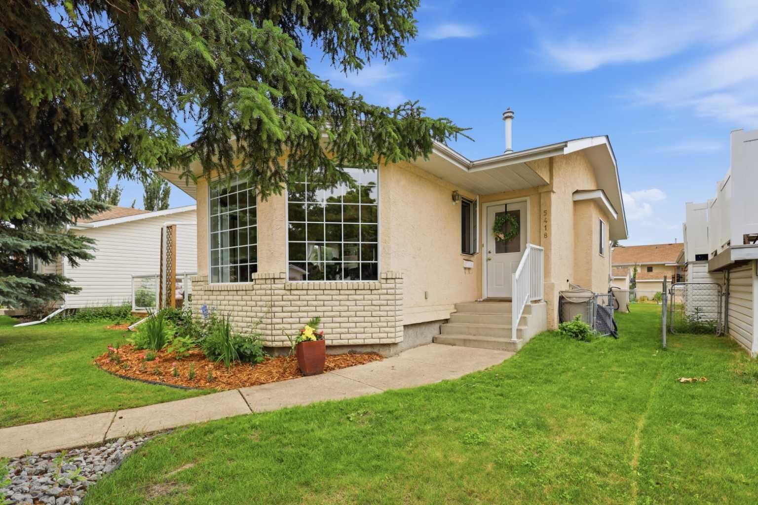Property Photo:  5418 46 Street  AB T4L 1H2 