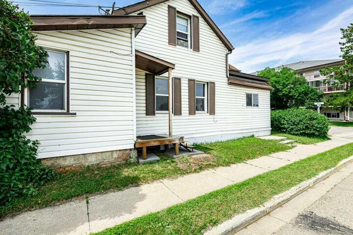 Property Photo: 5003 48 Street AB T4G 1M2
