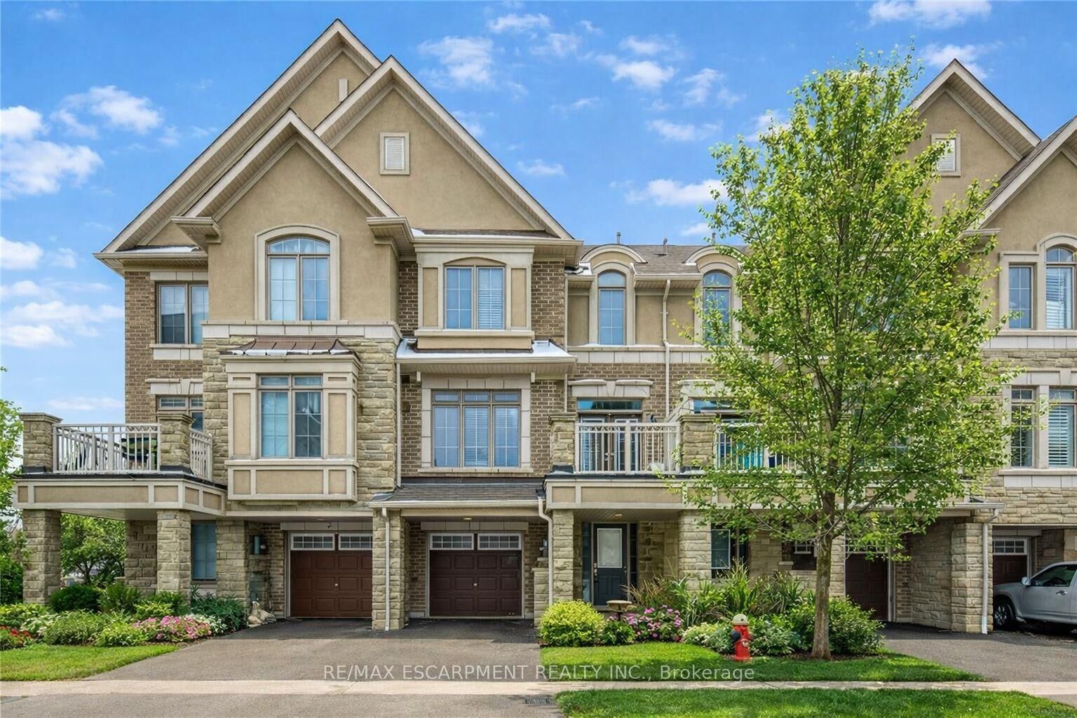 Property Photo: 2435 Greenwich Drive 74 ON L6M 0S4