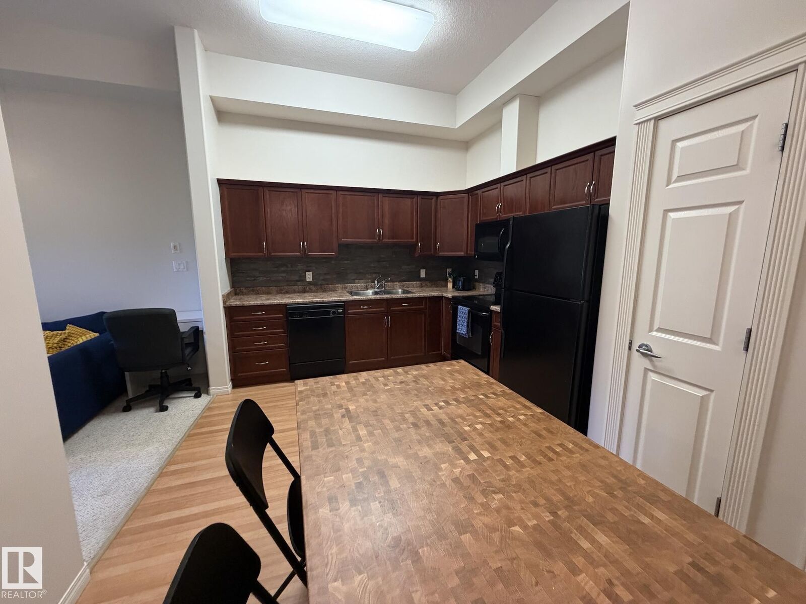 Property Photo: 8702 Southfort Drive 104 AB T8L 4R6
