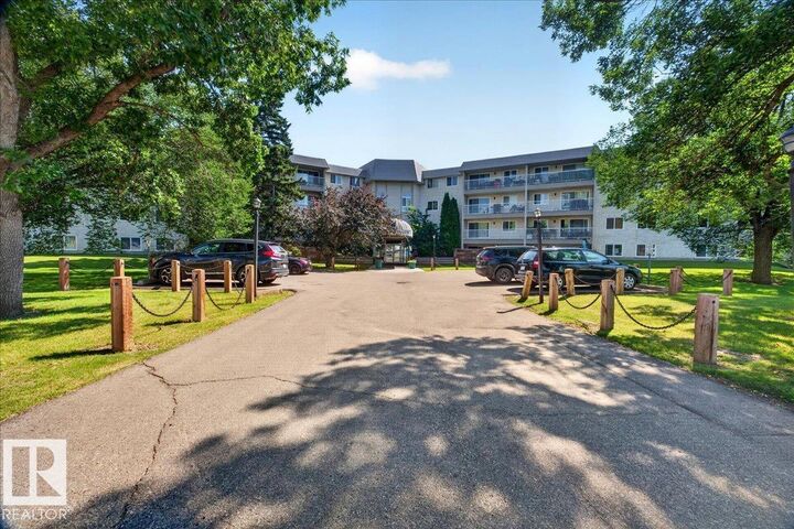 Property Photo: 5125 Riverbend Road NW 406 AB T6H 5K5