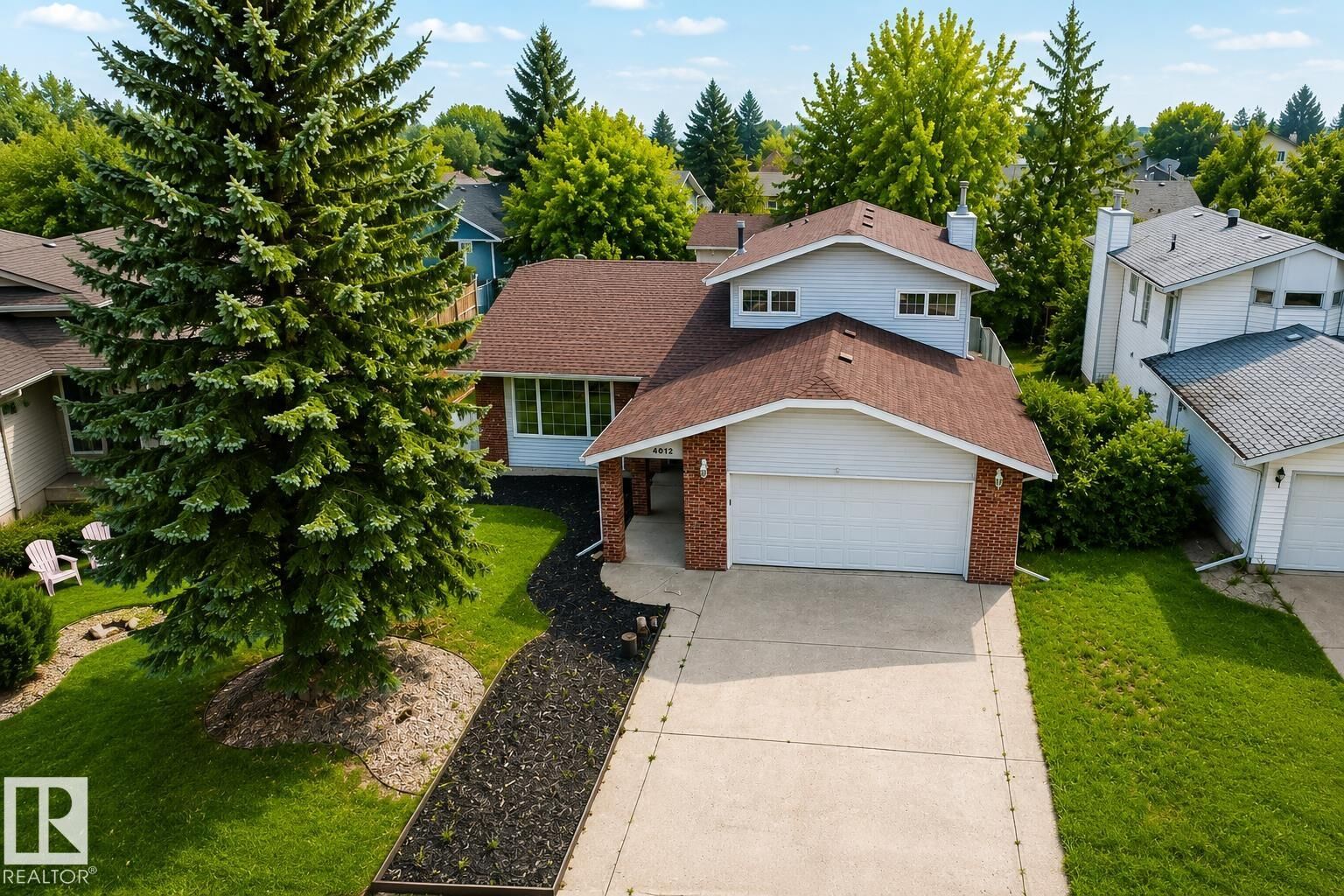 Property Photo: 4012 41 Avenue AB T9N 1T7