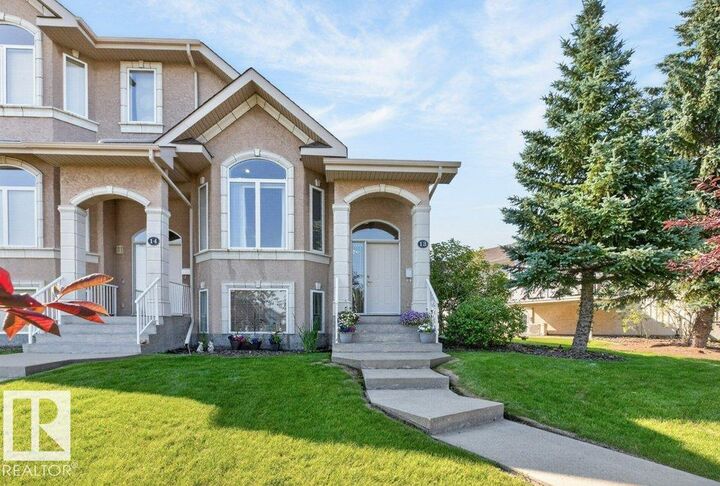 Property Photo: 101 Jim Common Drive 13 AB T8H 2M1