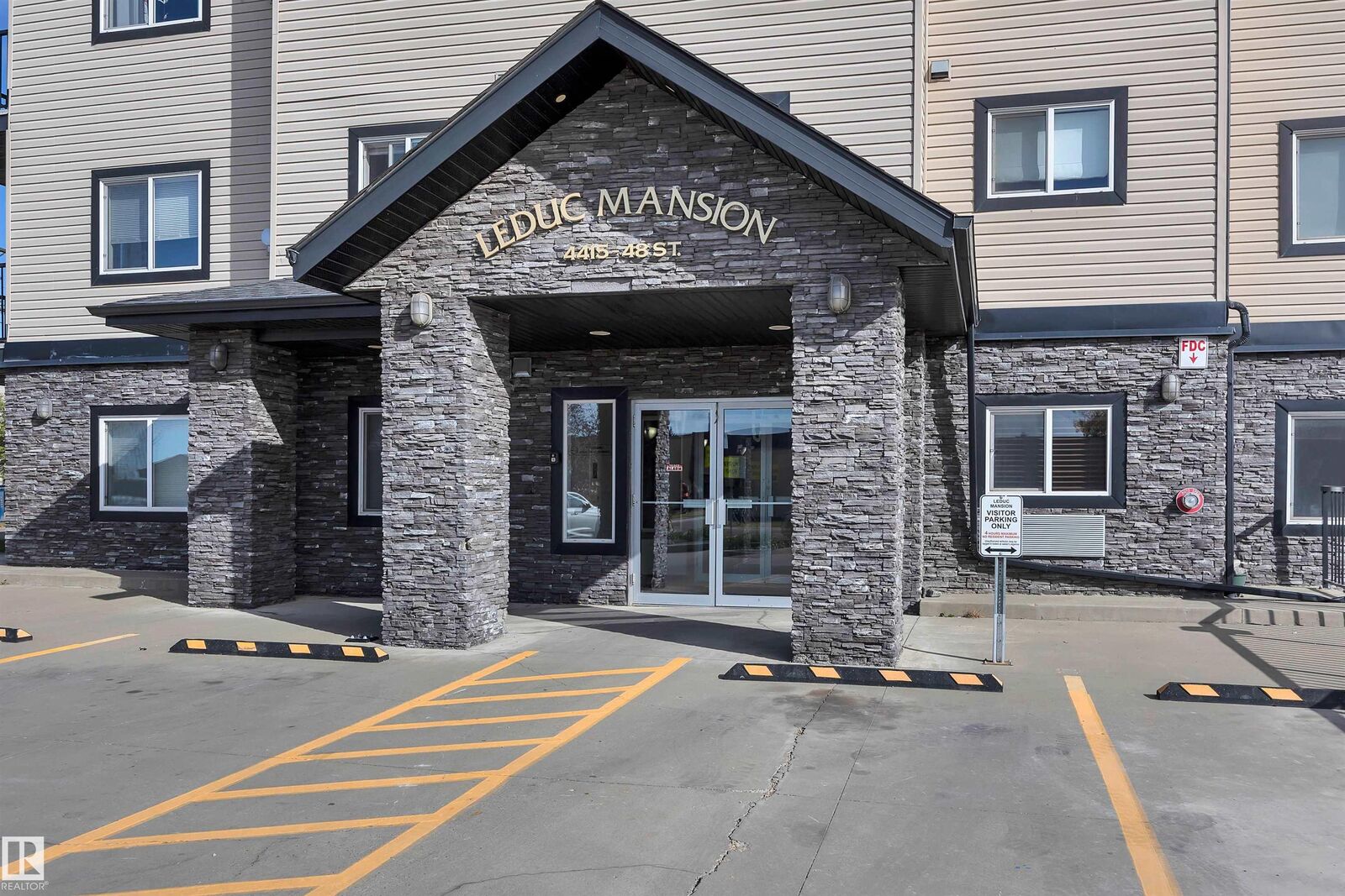 Property Photo: 4415 48 Street 411 AB T9E 5Y3