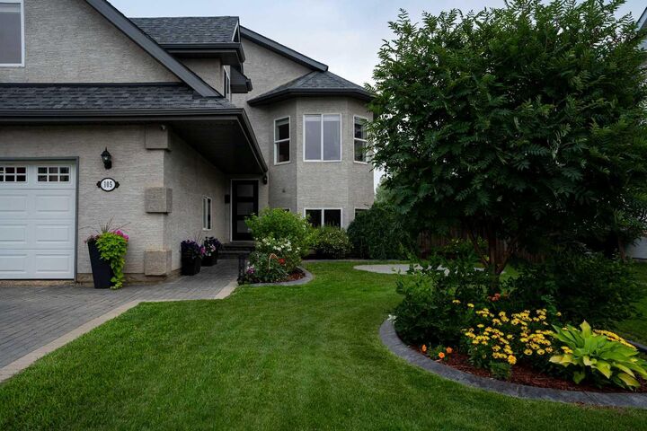 Property Photo: 105 Lindstrom Crescent AB T9K 2N7