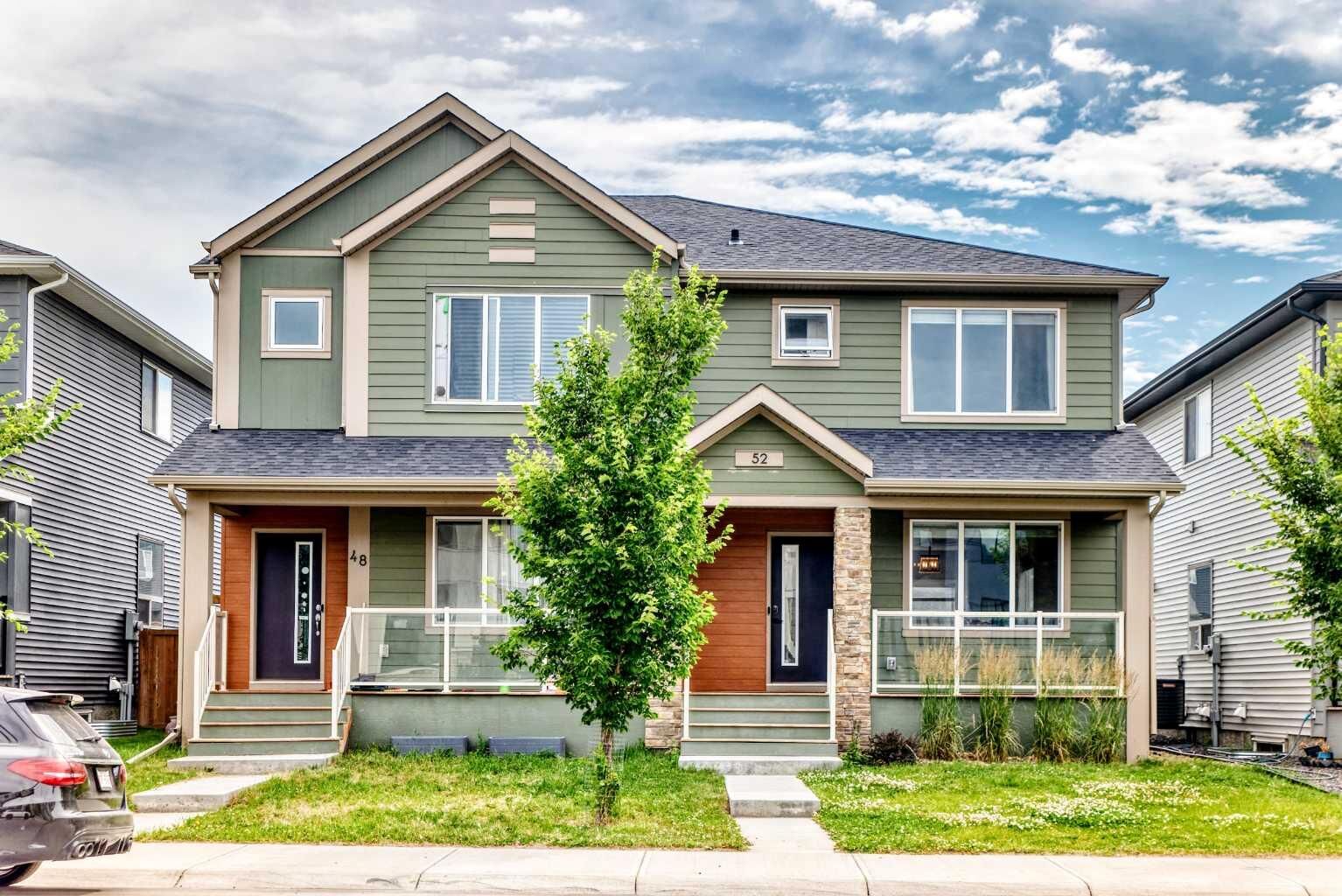 Property Photo: 52 Wolf Creek Drive SE AB T2X 4W9