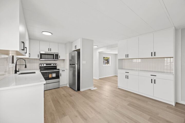 Property Photo: 6220 17 Avenue SE 216 AB T2A 4V5