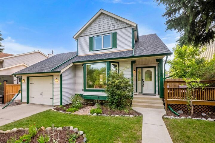 Property Photo: 148 Woodridge Drive SW AB T2W 5M2