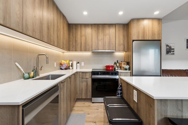 Property Photo: 3596 Malsum Drive 204 BC V7G 0B5