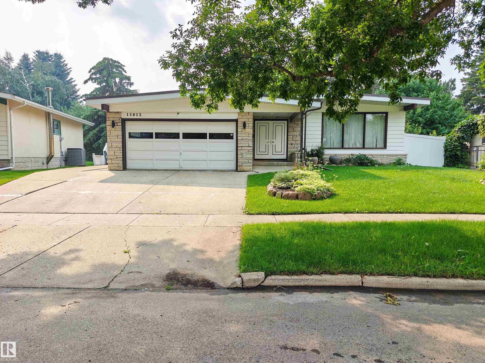 Property Photo:  15012 63 Street NW  AB T5A 2B8 