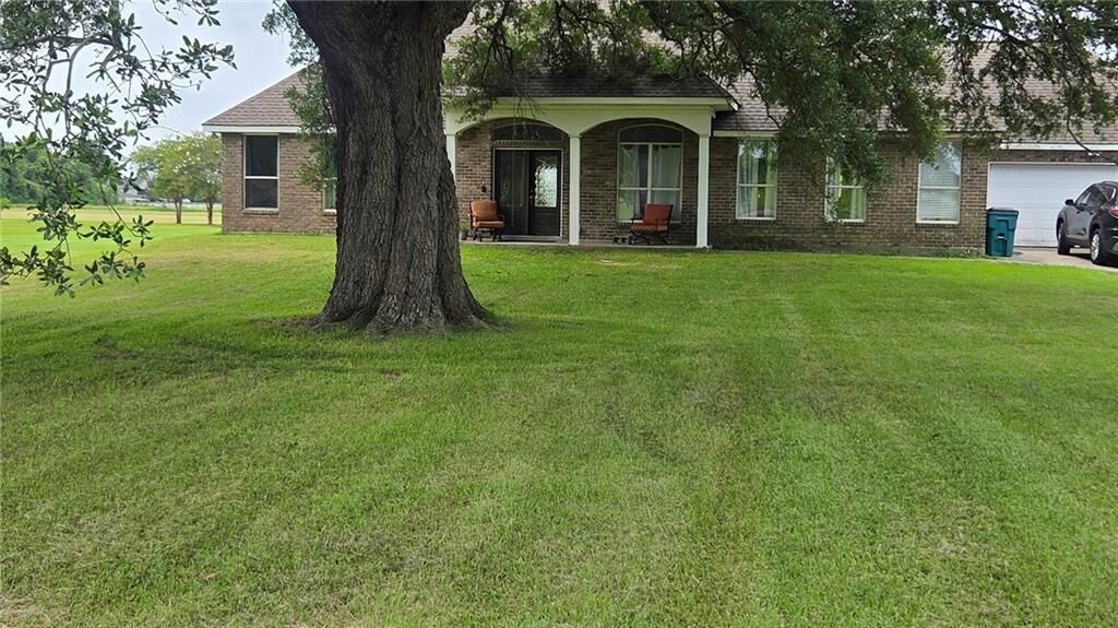 Property Photo:  9523 River Road  LA 70094 
