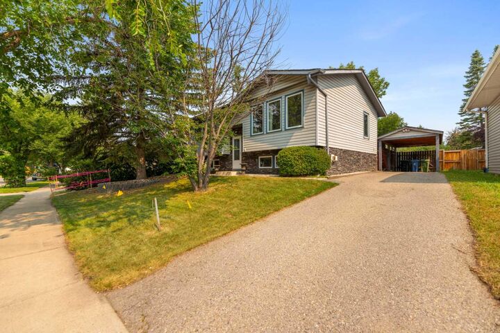 Property Photo:  14695 Deer Ridge Drive SE  AB T2J 6A8 