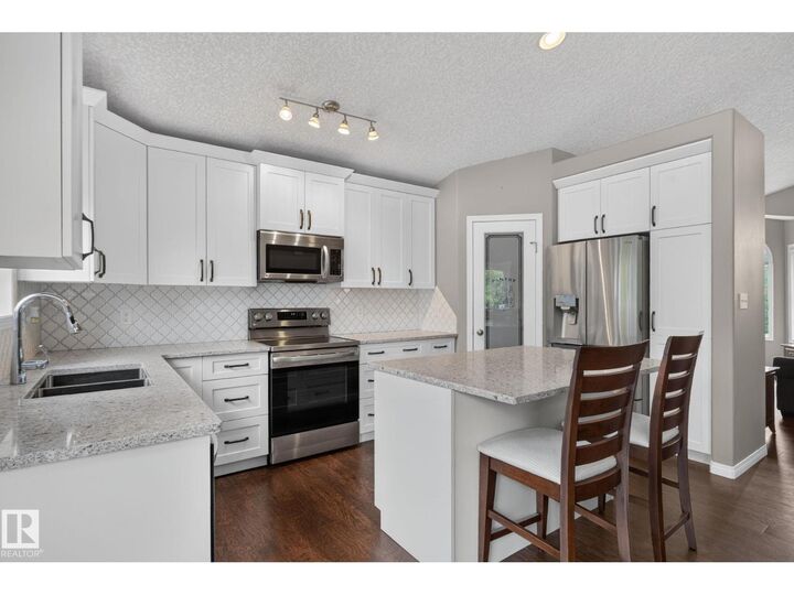 Property Photo: 4914 152A Av NW AB T5Y 3C1