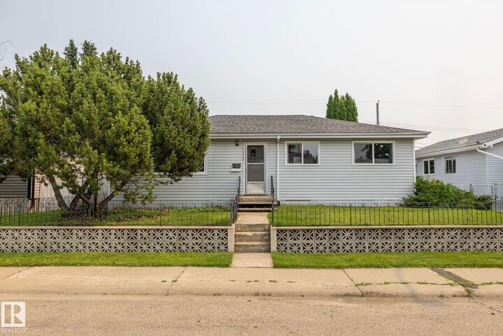 Property Photo: 13207 77 Street NW AB T5C 1C8