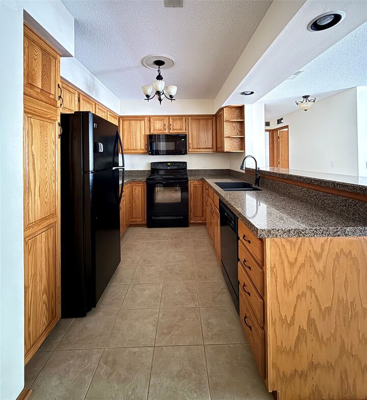 Property Photo:  409 SE Delaware Avenue 211  IA 50021 