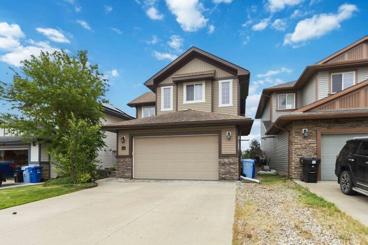 Property Photo: 113 Merganser Place AB T9K 0S4
