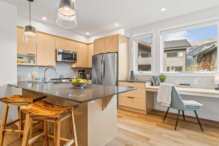 Property Photo: 209 Stewart Creek Rise 202G AB T1W 0N9
