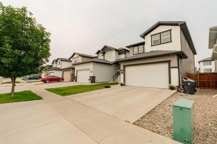 Property Photo:  855 Miners Boulevard W  AB T1J 5B9 