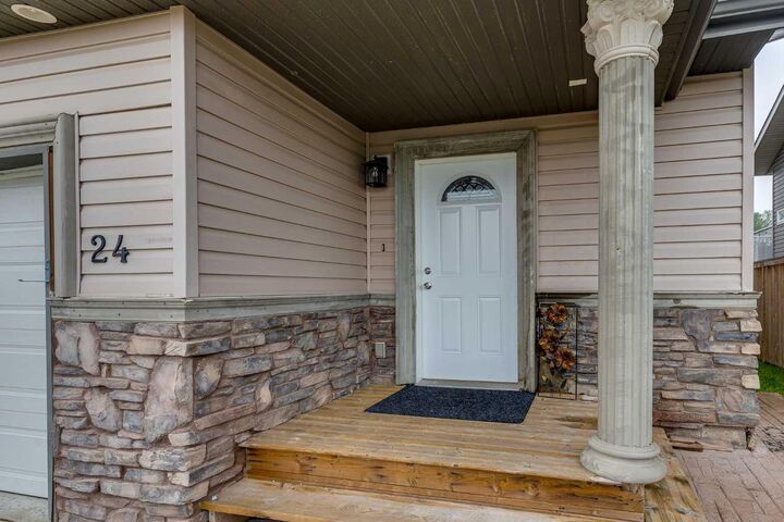 Property Photo:  24 Mackenzie Crescent  AB T4L 0B2 
