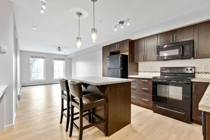 Property Photo: 755 Copperpond Boulevard SE 1315 AB T2Z 4R2
