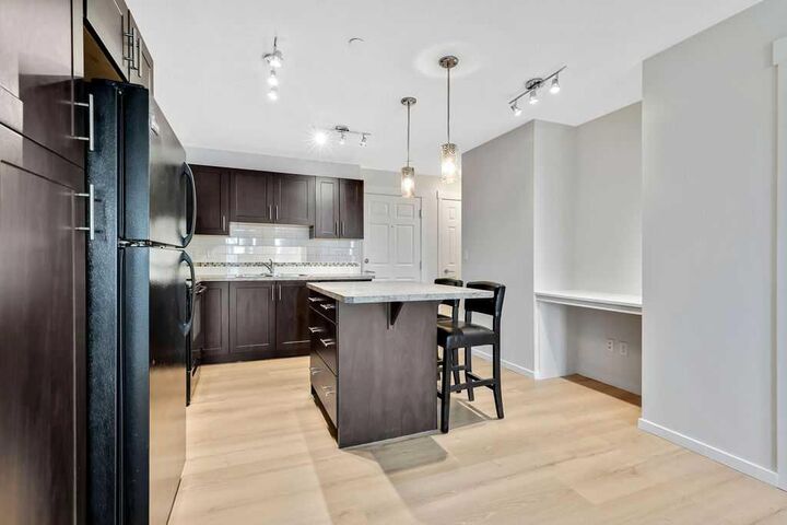 Property Photo:  755 Copperpond Boulevard SE 1315  AB T2Z 4R2 