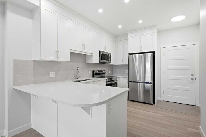 81 Arbour Lake View NW 1410 — photo 1