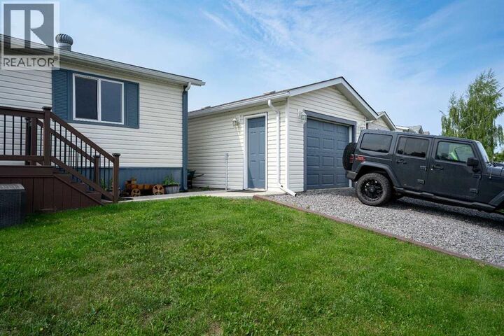 Property Photo: 161 Harpe Way AB T9K 2K6