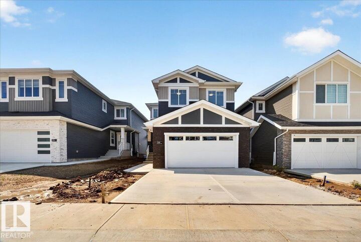 Property Photo: 3308 Chickadee Drive NW AB T5S 0V5