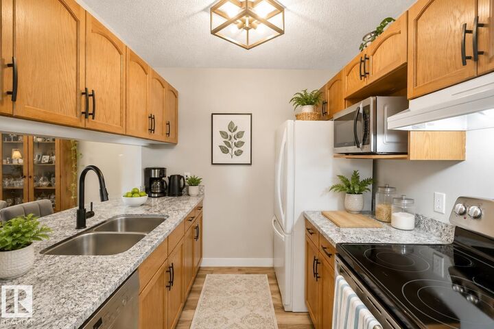 Property Photo: 17447 98A Avenue NW 329 AB T5T 6M4
