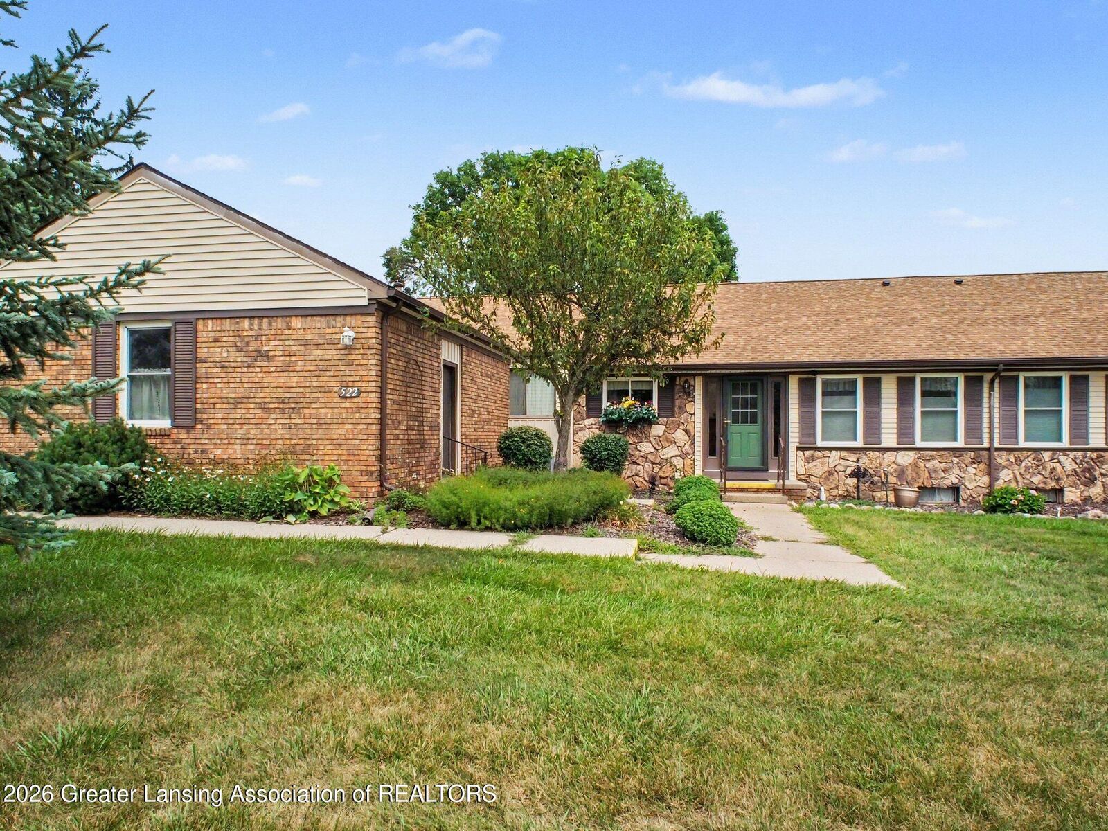Property Photo:  522 Red Cedar Boulevard  MI 48895 