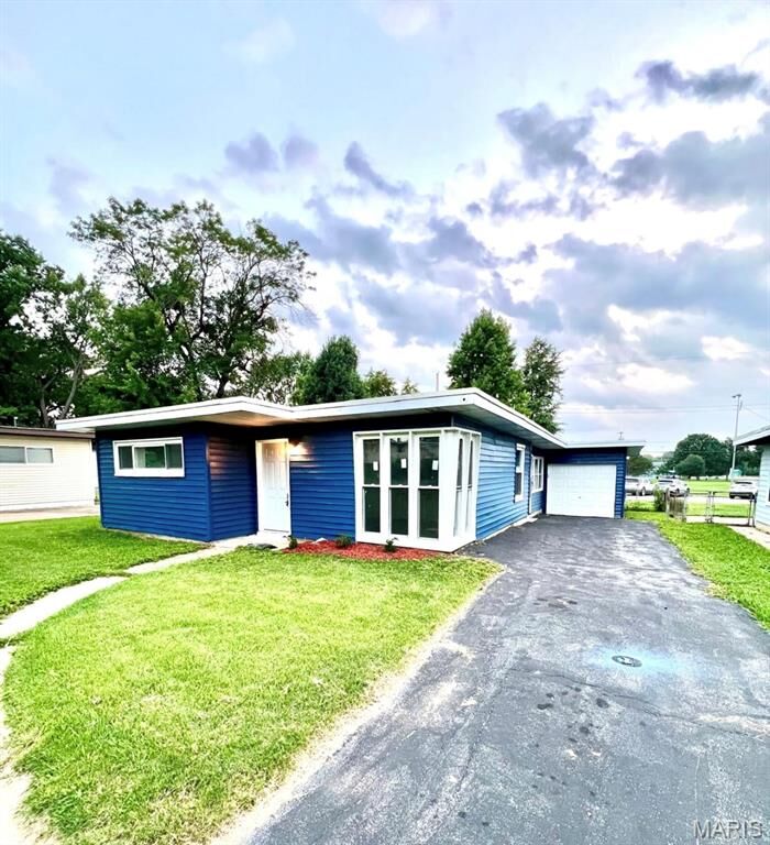 Property Photo:  1305 Saint Jean Street  MO 63031 