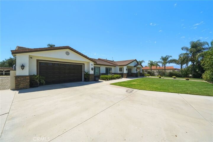 Property Photo:  5685 Oak Tree Cir  CA 92509 