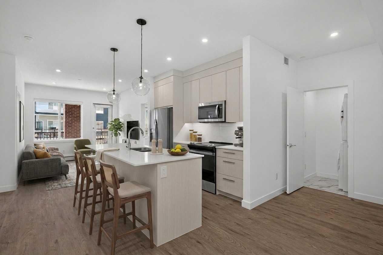 Property Photo:  6 Merganser Drive W 3201  AB T1X 2Y2 
