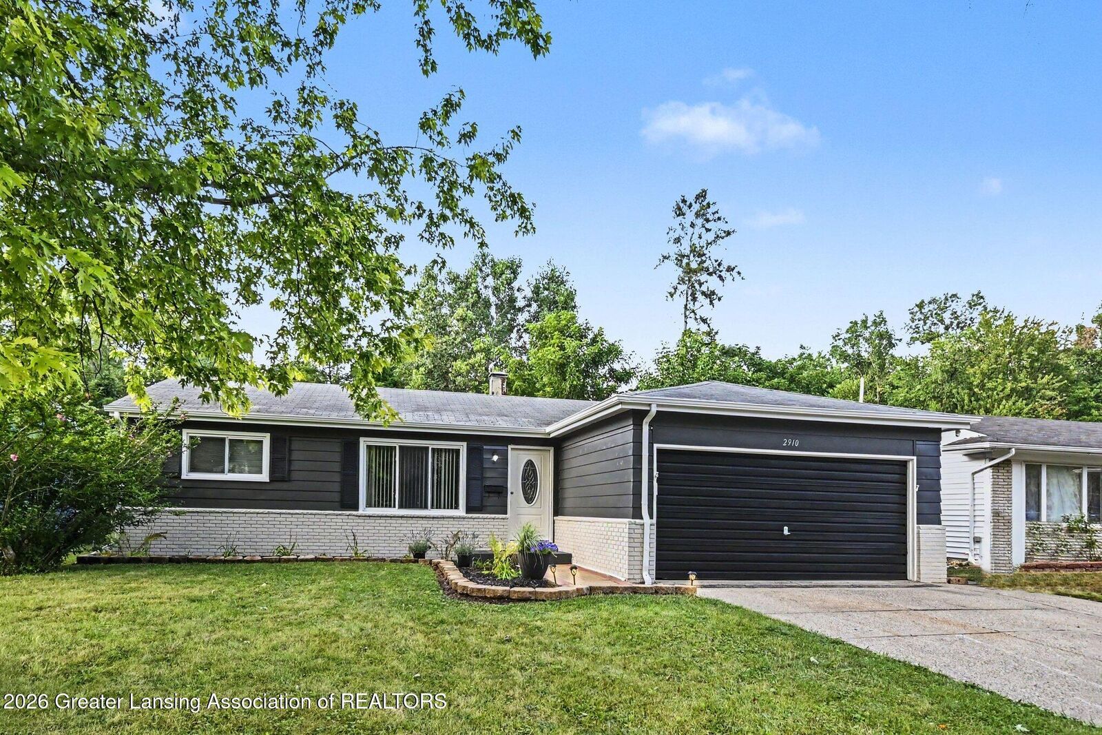 Property Photo:  2910 Gibson Street  MI 48911 