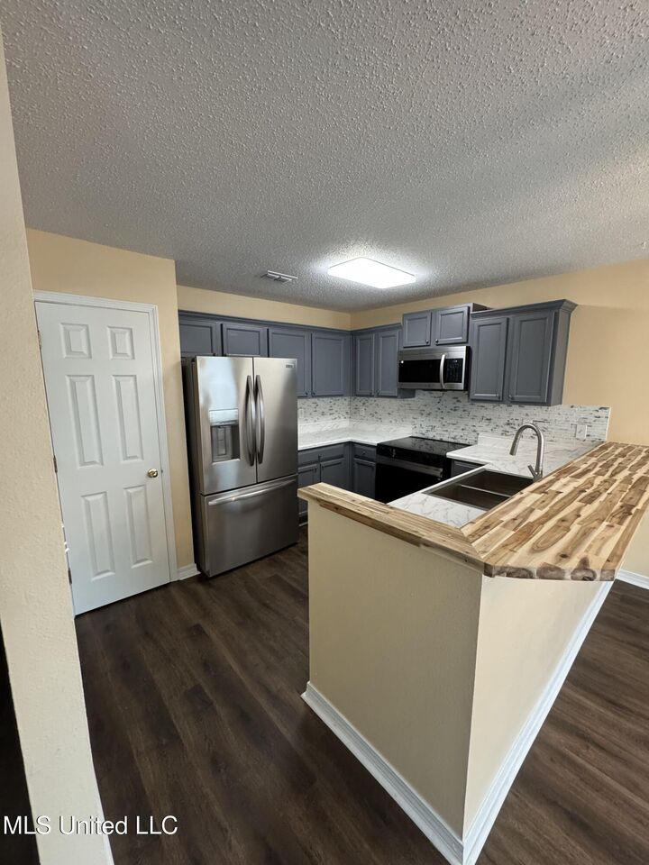 Property Photo:  13401 Warren Drive  MS 39503 