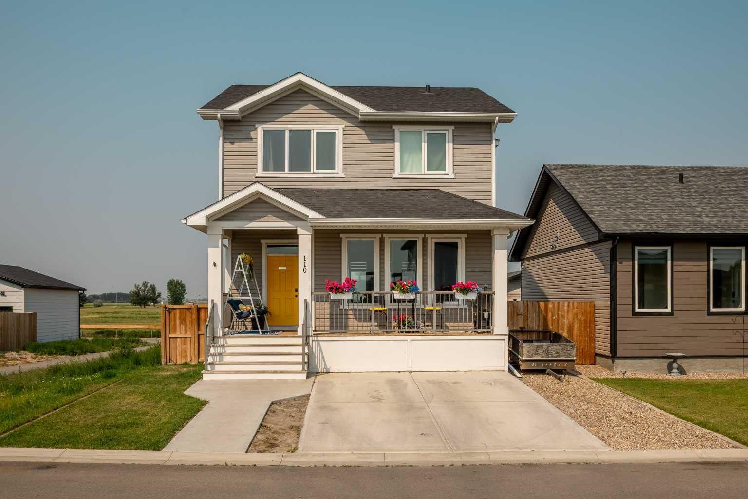 Property Photo: 110 Prairie Gold Street AB T1G 0G3
