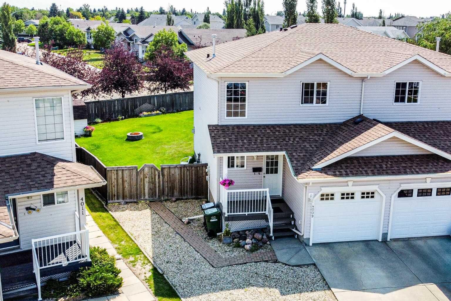 Property Photo: 4009 69A Street Close AB T4V 4X9