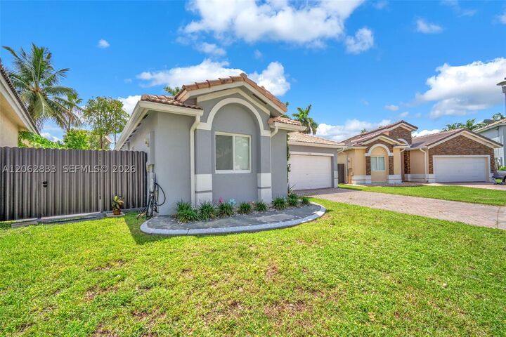 Property Photo:  14331 SW 155th Ct  FL 33196 