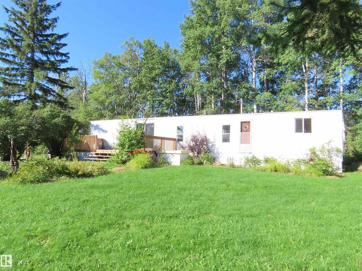 Property Photo: 210 55504 Nikoodi Road AB T0E 0X0