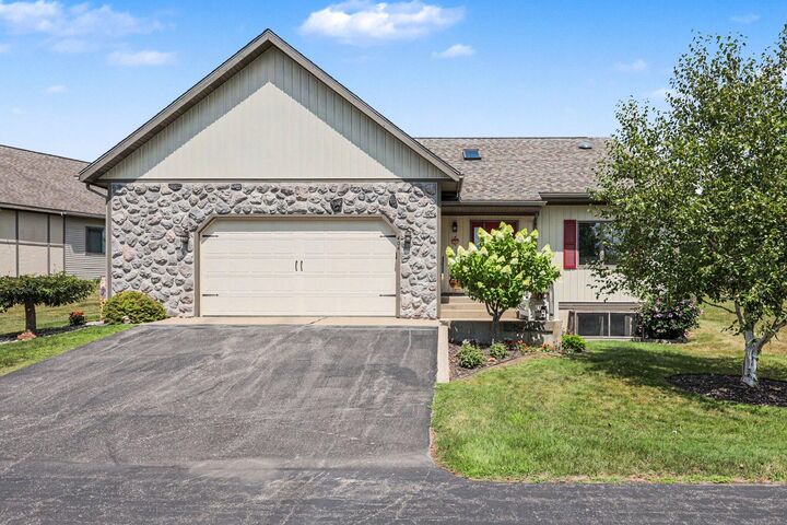 Property Photo:  404 Vienna Lane  MI 49412 