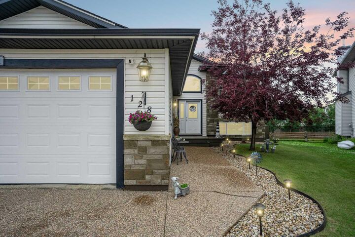 Property Photo:  128 Dogwood Lane  AB T9K 0G8 