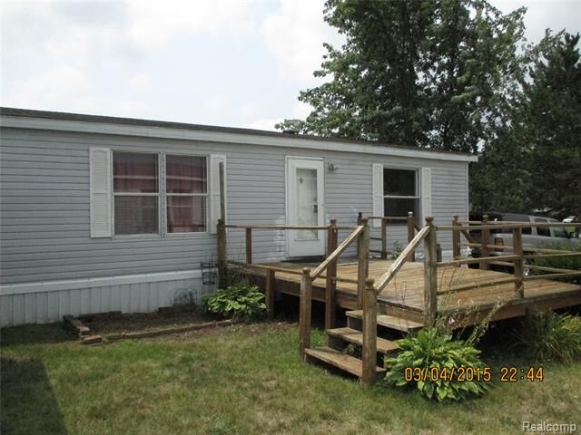 Property Photo:  6988 McKean 176  MI 48197 
